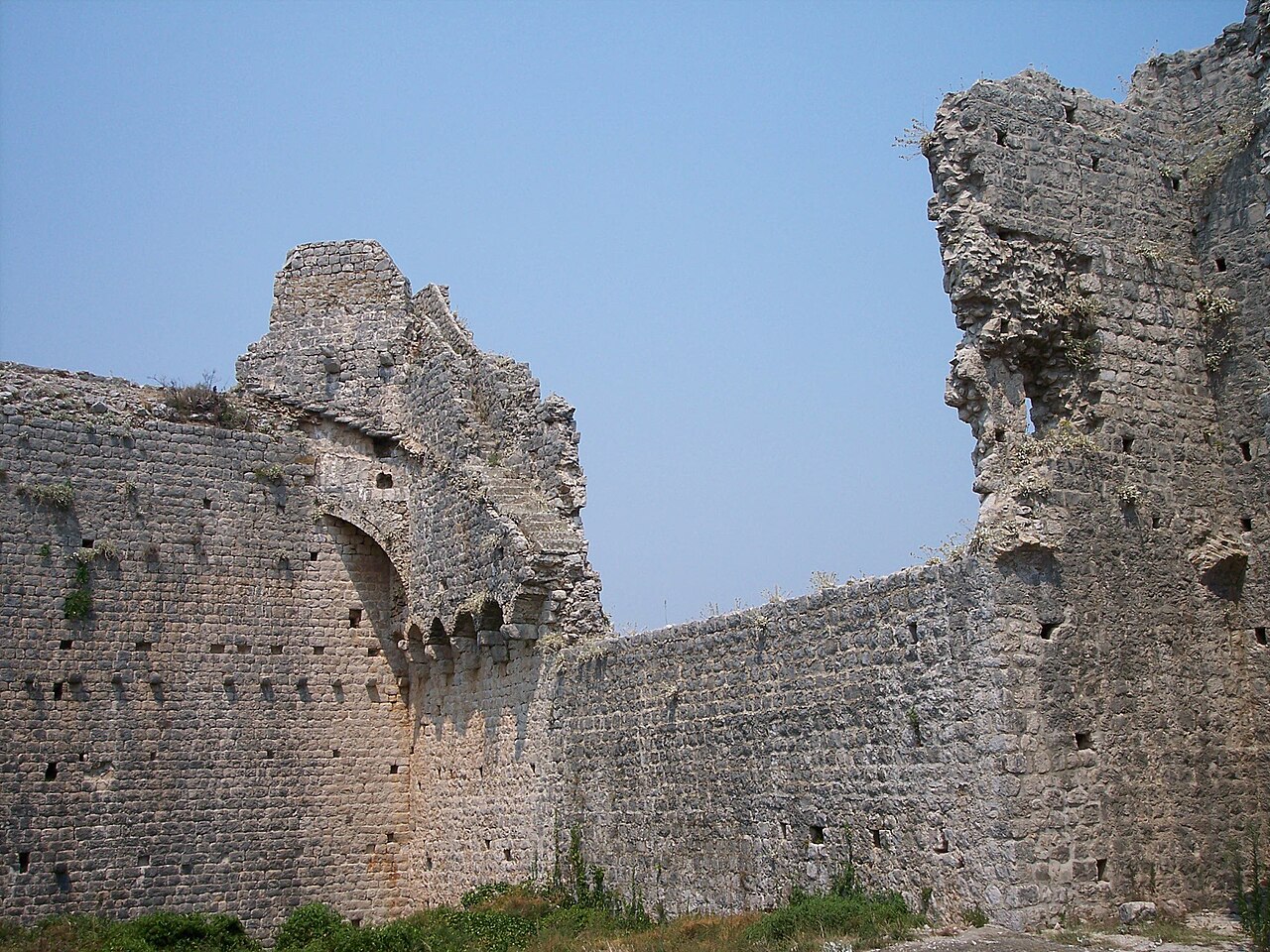 Ston medieval defensive walls stretching across limestone hills on Peljesac Peninsula Croatia