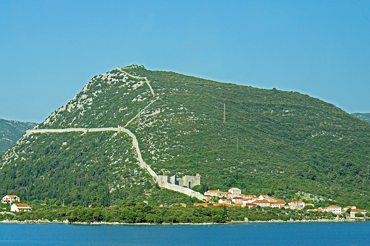 Mali Ston waterfront with traditional seafood restaurants and yacht moorings in Croatia